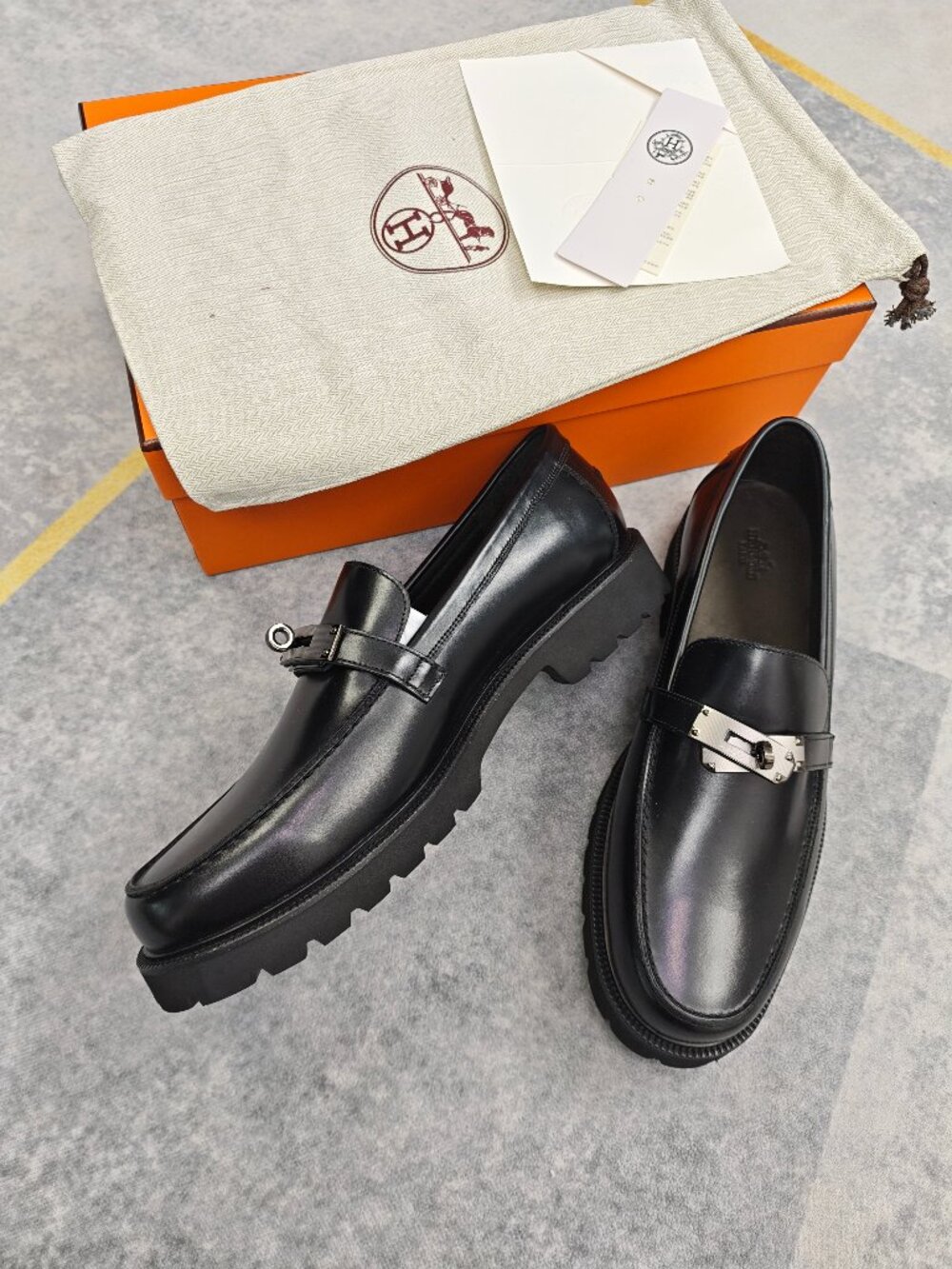 Hermes Black Leather Women's Loafers with Silver Buckle